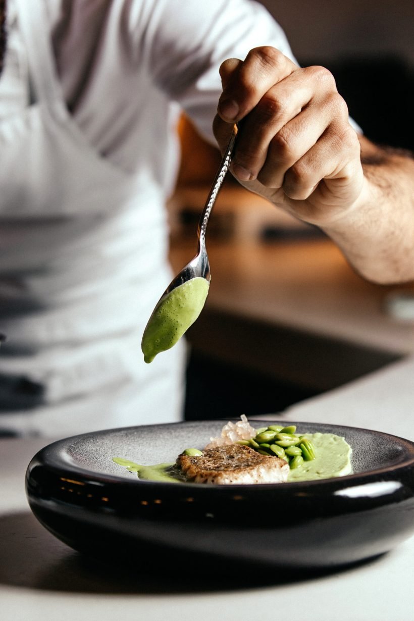 front-view-cook-preparing-food-inside-kitchen-food-meal-fry-cook